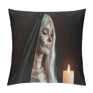 Personality  A Woman In The Image Of An Attractive Mysterious Witch With White Ashy Hair Holds A Burning Candle. Creative Makeup For Halloween Party. Black Poppy And Dark Backdrop. Celebrating Dia De Los Muertos Pillow Covers