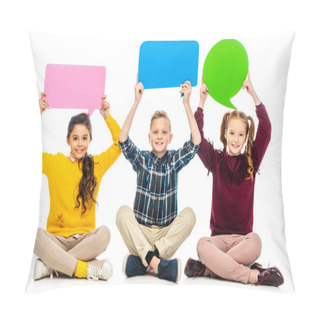 Personality  Smiling Kids Sitting And Holding Speech Bubbles Over Heads Isolated On White Pillow Covers