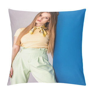 Personality  Attractive Fashionable Girl Posing In Green Summer Trousers And Yellow T-shirt On Grey And Blue Pillow Covers
