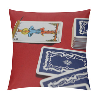 Personality  Scattered Deck Of Tarot Cards With One Card Upside Down And Candle On Red Background. Pillow Covers