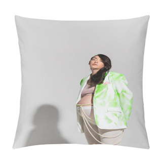 Personality  Stylish Pregnant Woman With Wavy Brunette Hair Looking At Camera While Posing In Green And White Blazer, Crop Top, Leggings And Beads Belt On Grey Background, Expectation, Maternity Fashion Concept Pillow Covers