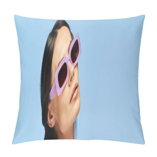 Personality  A Stylish Woman Wearing Sunglasses Gazes Up At The Sky Against A Blue Studio Backdrop. Pillow Covers