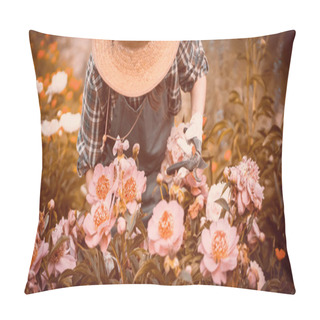 Personality  A Girl In A Straw Hat And Gloves Looks After Bushes Of Lush Pink Peonies Pillow Covers