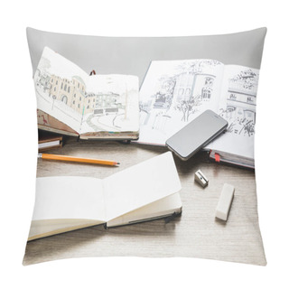 Personality  Selective Focus Of Drawing Albums, Drawing Utensils And Smartphone On Wooden Table Pillow Covers