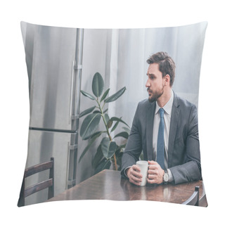 Personality  Sad Man In Gray Suit Sitting At Wooden Table And Holding White Cup At Home, Grieving Disorder Concept Pillow Covers