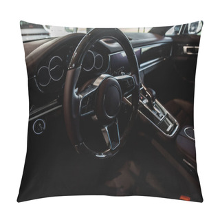 Personality  KYIV, UKRAINE - OCTOBER 7, 2019: Selective Focus Of Steering Wheel Near Changing Gear In Porshe Pillow Covers