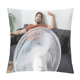 Personality  Pleased Bearded Man Sitting On Couch Near Blurred Electric Fan  Pillow Covers