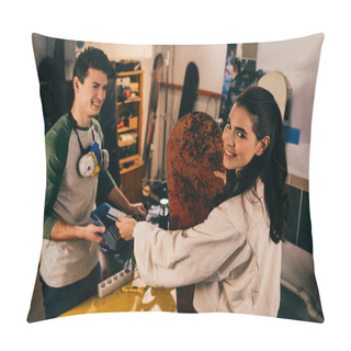Personality  Worker Holding Terminal And Smiling Woman Paying With Credit Card And Holding Snowboard In Repair Shop  Pillow Covers