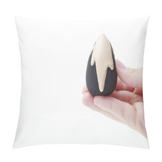 Personality  Black Beauty Blender With Foundation In Female Hand On White Background, Copy Space Pillow Covers