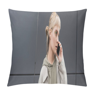 Personality  Stylish Young Woman With Bangs And Blonde Hair Talking On Smartphone And Standing In Hoodie And Coat Near Grey Modern Building On Urban Street, Banner, Looking Away, Urban Lifestyle  Pillow Covers
