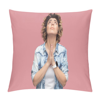 Personality  Portrait Of Hopeful Young Woman With Curly Hairstyle In Casual Blue Shirt Standing With Palm Hand Gesture And Praying On Pink Background Pillow Covers