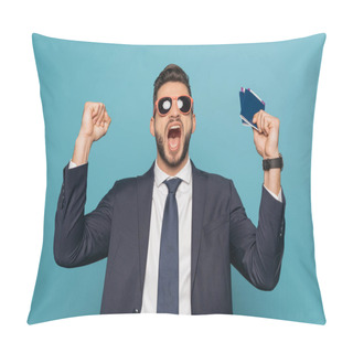Personality  Excited Businessman In Sunglasses Screaming And Showing Winner Gesture While Holding Passports And Air Tickets Isolated On Blue Pillow Covers