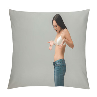 Personality  Displeased And Overweight Asian Woman Gesturing And Looking At Jeans Isolated On Grey Pillow Covers