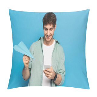 Personality  Happy Young Man Chatting On Smartphone While Holding Paper Plane On Blue Pillow Covers