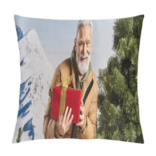 Personality  Cheerful Santa Holding Present And Smiling At Camera With Mountains Backdrop, Winter Concept, Banner Pillow Covers