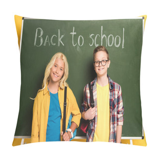 Personality  Smiling Schoolkids With Backpacks Standing Near Chalkboard With Back To School Lettering  Pillow Covers