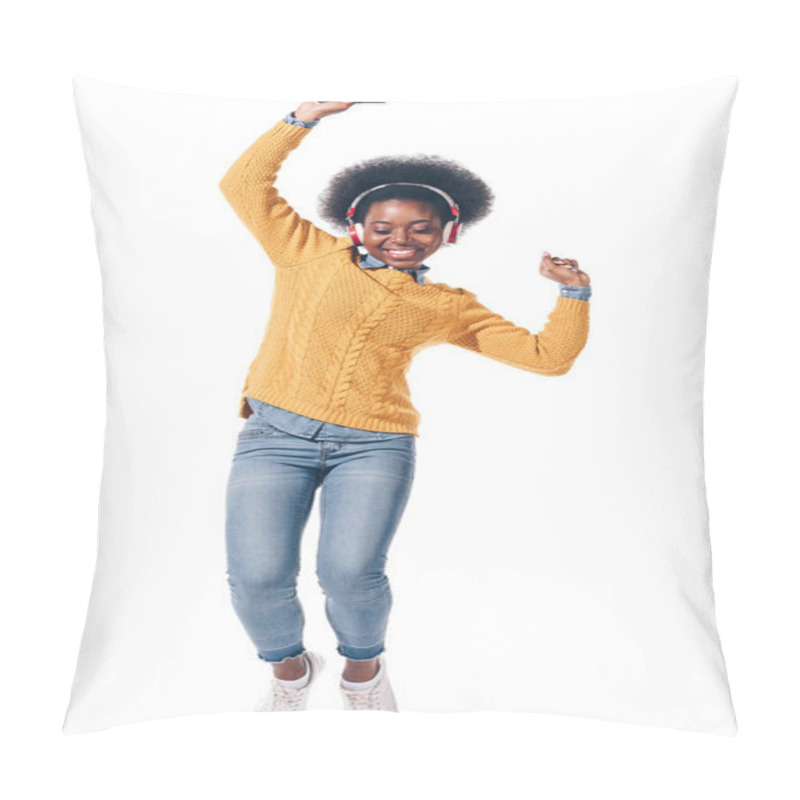 Personality  happy african american girl dancing while listening music with headphones, isolated on white pillow covers