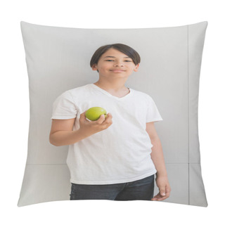 Personality  Smiling Asian Boy Holding Ripe Apple Near Wall At Home  Pillow Covers