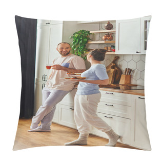 Personality  Cheerful Bearded Man In Homewear Holding Tea And Looking At Girlfriend With Preakfast In Kitchen Pillow Covers