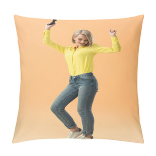 Personality  Smiling Blonde Girl Holding Joystick And Dancing On Orange Background Pillow Covers