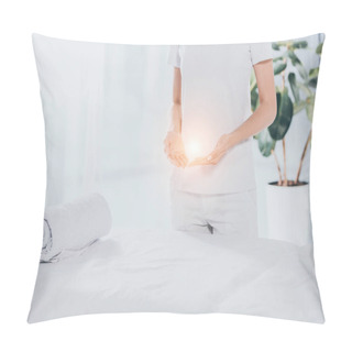 Personality  Mid Section Of Reiki Healer With Light Energy In Hands Standing Near White Massage Table  Pillow Covers