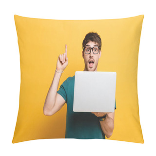Personality  Excited Young Man Showing Idea Gesture While Holding Laptop On Yellow Pillow Covers