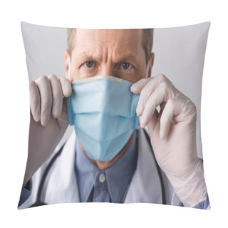 Personality  Mature Doctor Touching Blue Medical Mask Isolated On Grey  Pillow Covers