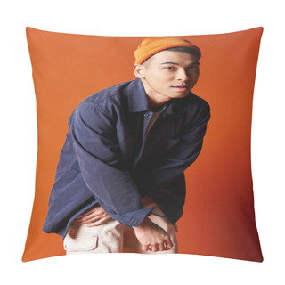 Personality  A Handsome Asian Man Exudes Style In A Blue Shirt And Orange Hat Against A Vibrant Orange Background. Pillow Covers