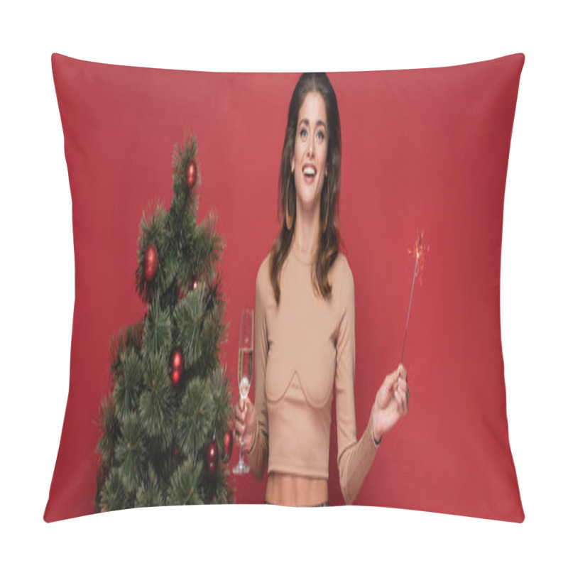 Personality  Excited Woman Holding Glass Of Champagne And Bright Sparkler Near Decorated Christmas Tree On Red, Banner Pillow Covers