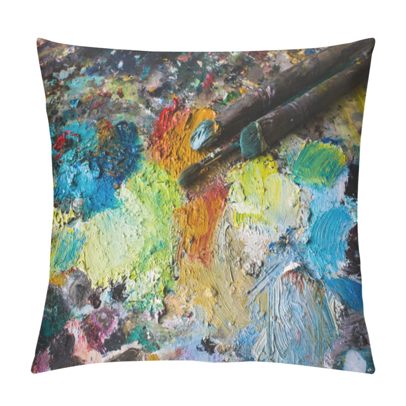Personality  Mixing oil paints on palette with various colors, top view. pillow covers