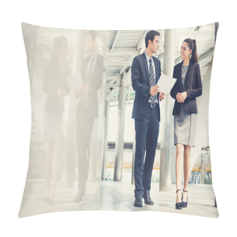 Personality  Businessman and businesswoman discussing work while walking pillow covers