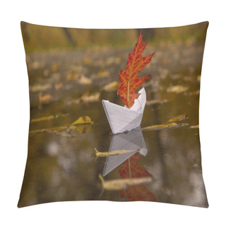 Personality  A Paper Boat Floats In A Puddle, Instead Of A Sail It Has A Red Oak Autumn Leaf. Pillow Covers