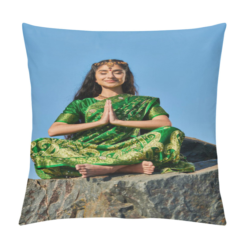 Personality  Smiling Indian Woman In Sari Meditating While Sitting On Stone With Blue Sky On Background Pillow Covers