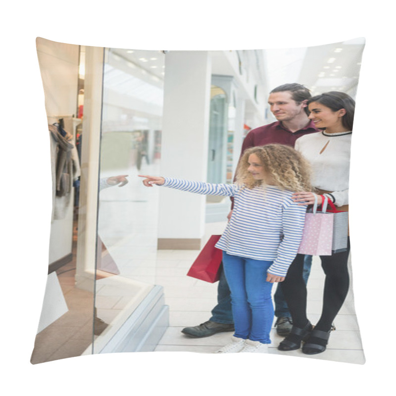 Personality  Happy family standing in front of shop pillow covers
