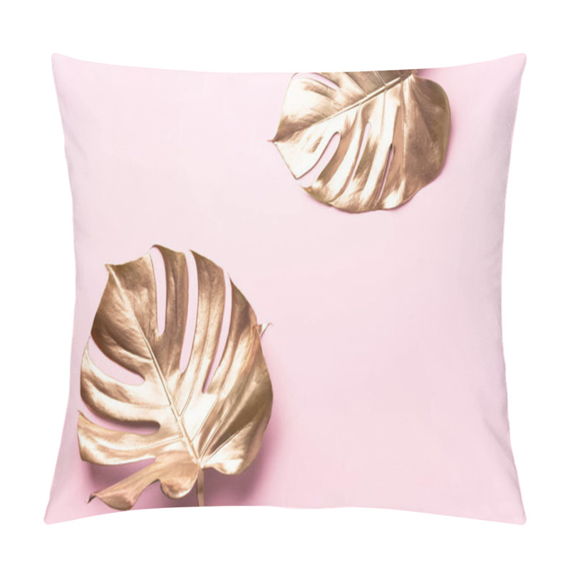 Personality  Exotic summer trend in minimal style. Golden tropical palm monstera leaf on pastel pink color background. Shiny and sparkle design, fashion concept. pillow covers