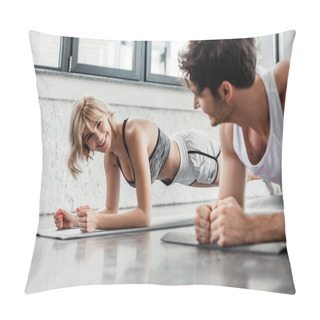 Personality  Selective Focus Of Happy Sportswoman Doing Plank And Looking At Man In Gym  Pillow Covers
