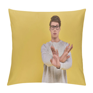 Personality  Young Sad Man In White Sweatshirt With Glasses Showing Denial Cross Hand Gesture On Yellow Backdrop Pillow Covers