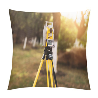 Personality  Surveyor Engineering Equipment With Theodolite And Total Station In A Garden Pillow Covers