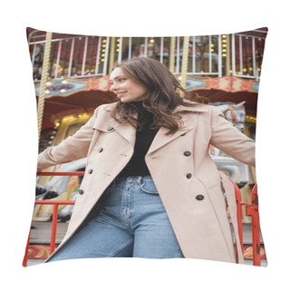 Personality  Cheerful Young Woman In Beige Trench Coat And Jeans Standing Near Carousel In Amusement Park Pillow Covers