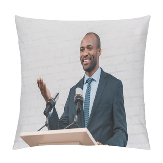 Personality  Happy African American Speaker Gesturing Near Microphones  Pillow Covers