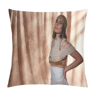 Personality  Stylish Model In Egyptian Attire And Bold Makeup Looking At Camera On Abstract Background Pillow Covers