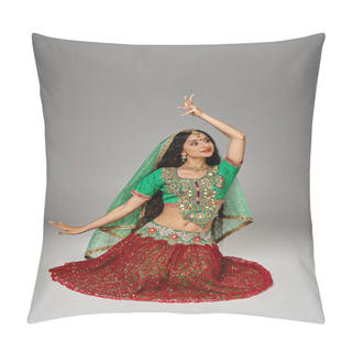 Personality  Vertical Shot Of Young Indian Woman In Red Skirt Sitting On Floor Gesturing And Looking Away Pillow Covers
