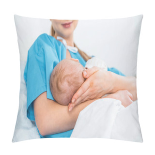 Personality  Low Angle View Of Smiling Young Mother Breastfeeding Newborn Baby On Bed In Hospital Room Pillow Covers