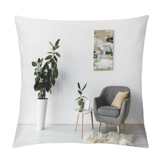 Personality  Grey Armchair Near Coffee Table With Green Plants And Frame In Modern Living Room  Pillow Covers
