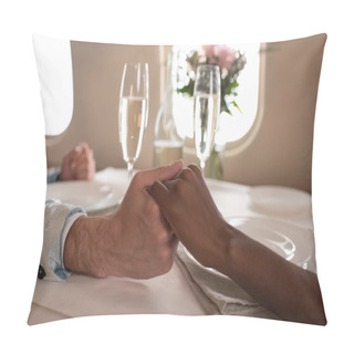 Personality  Cropped View Of Interracial Couple Holding Hands Near Glasses Of Champagne On Served Table In Private Jet Pillow Covers