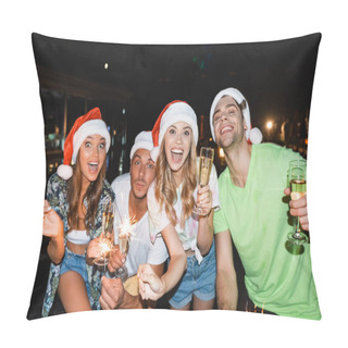 Personality  Excited Friends In Santa Hats With Sparklers And Champagne Looking At Camera At Night  Pillow Covers