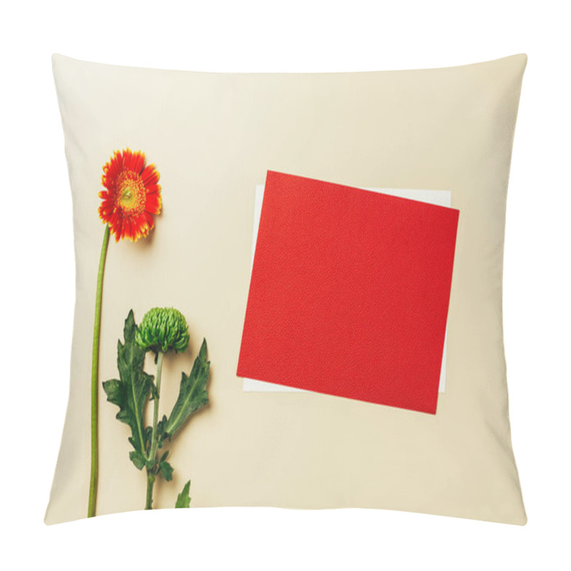 Personality  flat lay with arrangement of red and white blank cards, beautiful gerbera and chrysanthemum flowers on beige backdrop pillow covers