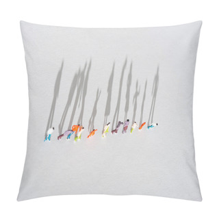 Personality  Top View Of Row Of Plastic People Figures On White Surface With Shadow Pillow Covers