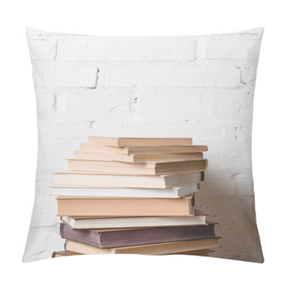 Personality  Pile Of Books Near White Brick Wall With Copy Space Pillow Covers