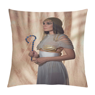 Personality  Stylish Woman In Egyptian Look And Pearl Top Holding Crook And Standing On Abstract Background Pillow Covers